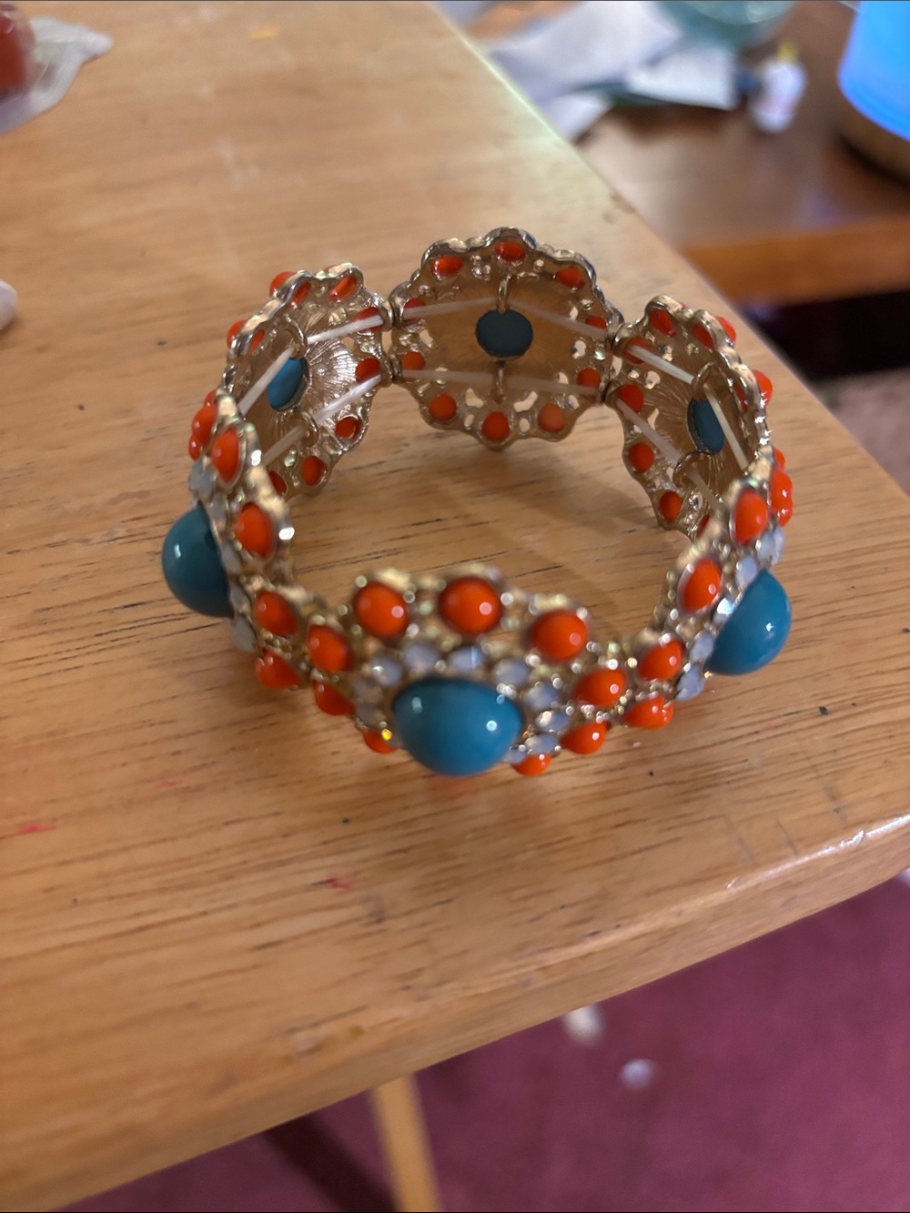 Gold-tone Turquoise and Orange Floral Stretch Bracelet